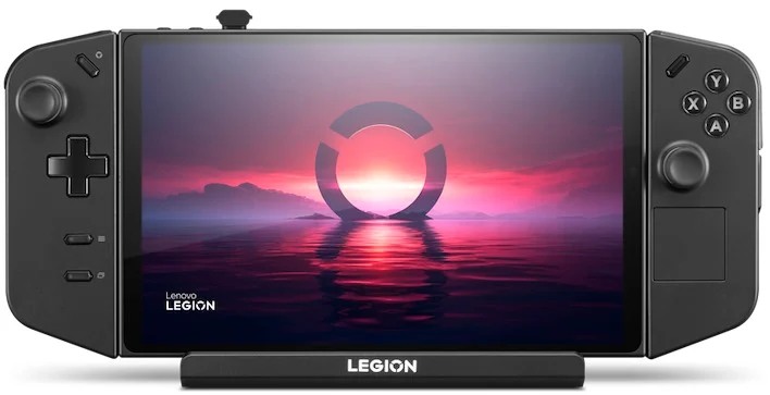 A Lenovo Legion Go handheld console connected to a monitor and peripherals in a desktop gaming setup.