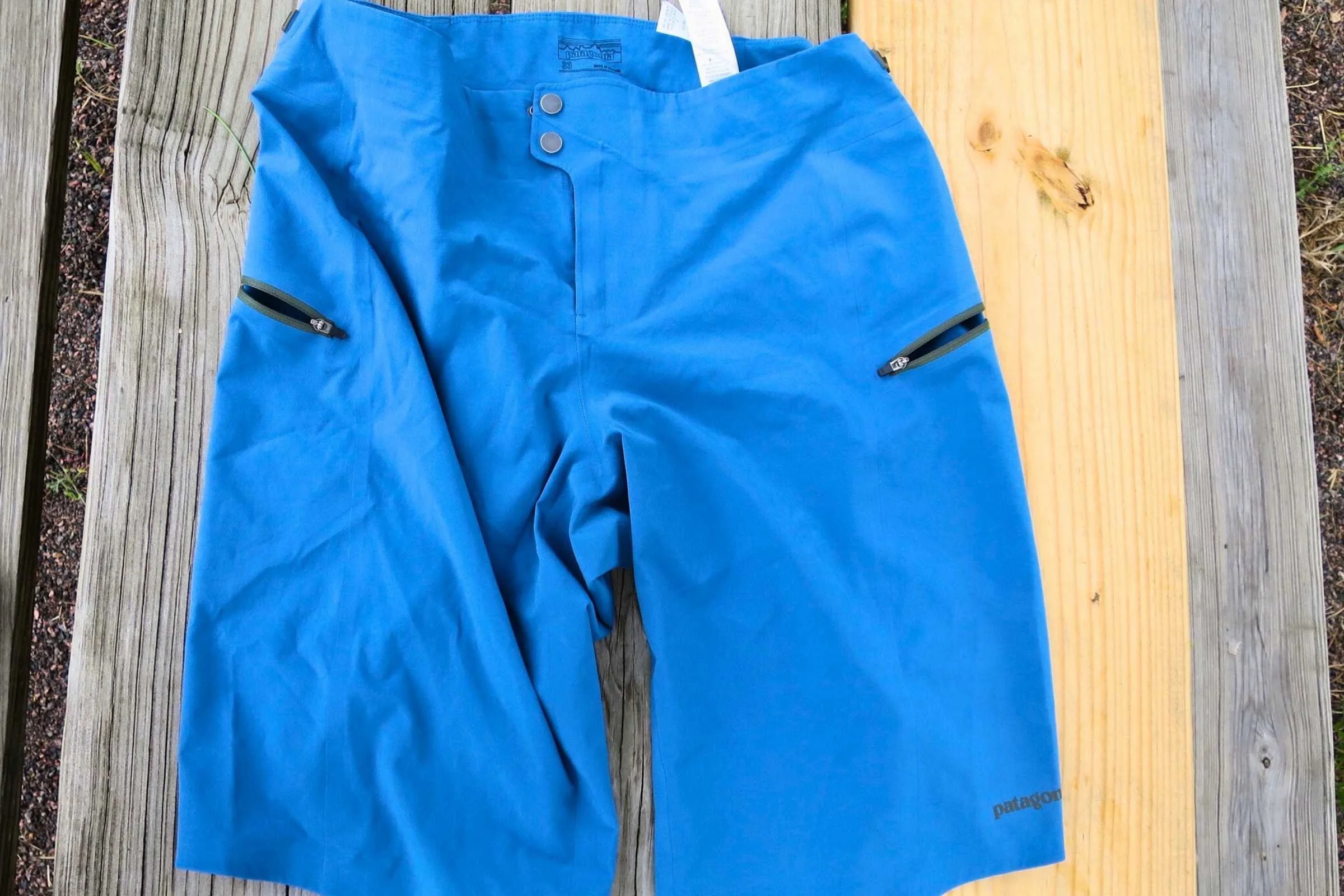 Close-up of the secure zippered pockets on a pair of Patagonia mountain bike shorts.