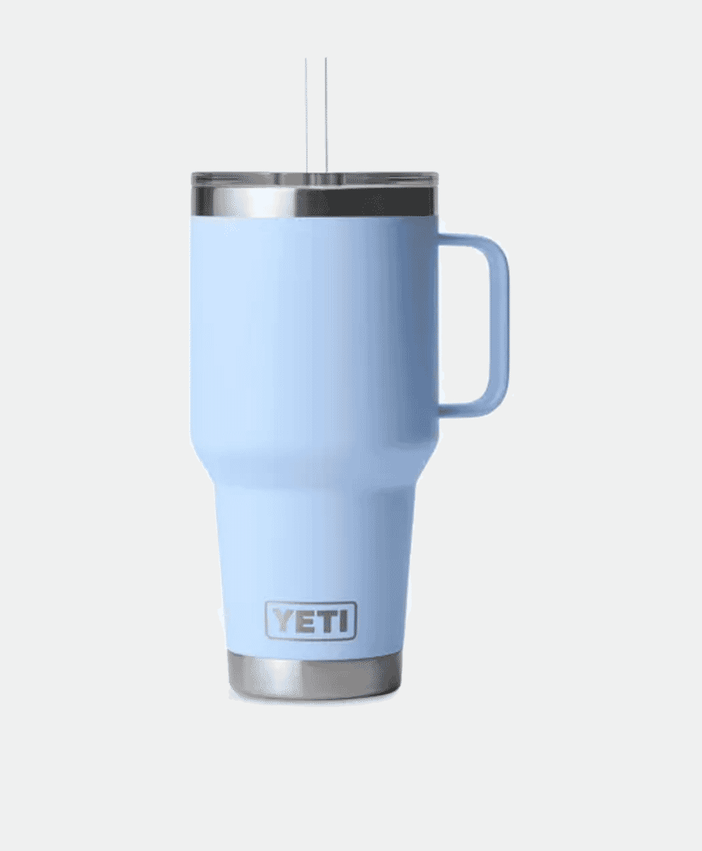A light blue Yeti Rambler tumbler with a handle and straw lid on a neutral background.