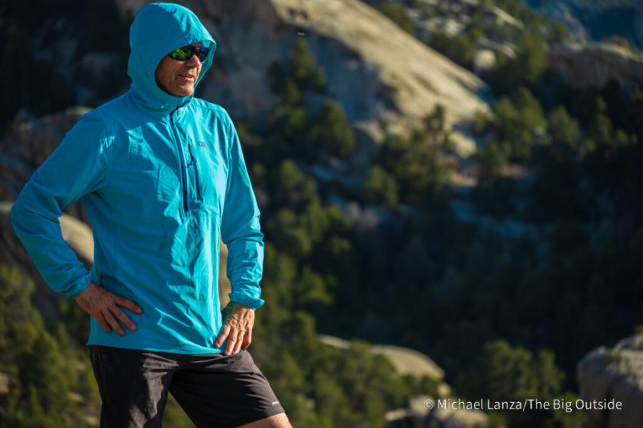 A climber wearing an Outdoor Research Astroman Air Sun Hoodie in Idaho's City of Rocks.