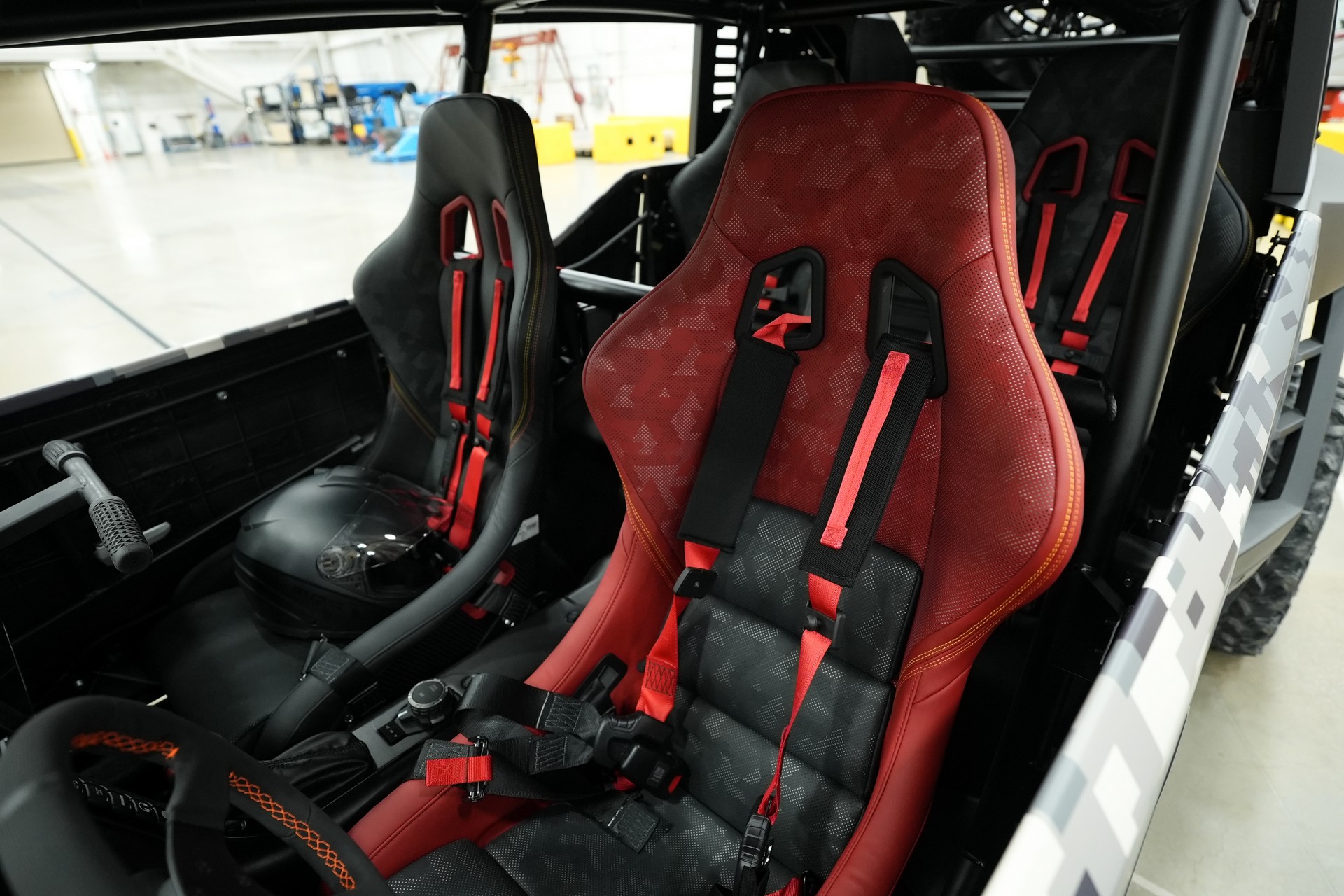 Interior view of the Scion 01 Concept showing the bucket seats and four-point racing harnesses.