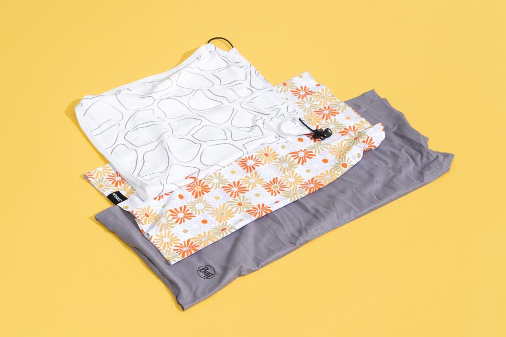 A collection of sun protection accessories including gaiters and shades.