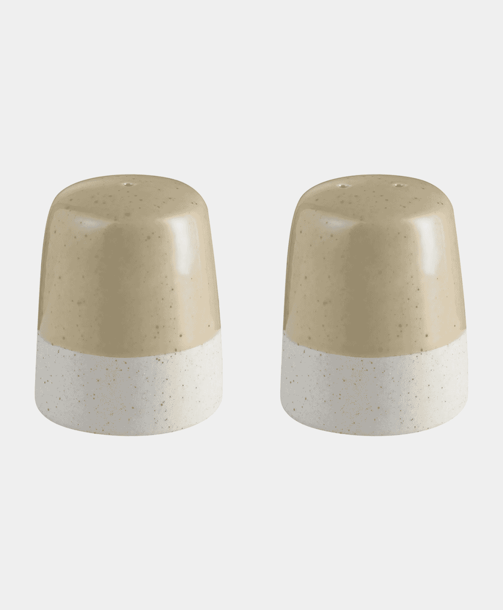 Two beige speckled ceramic salt and pepper shakers with a minimalist design.