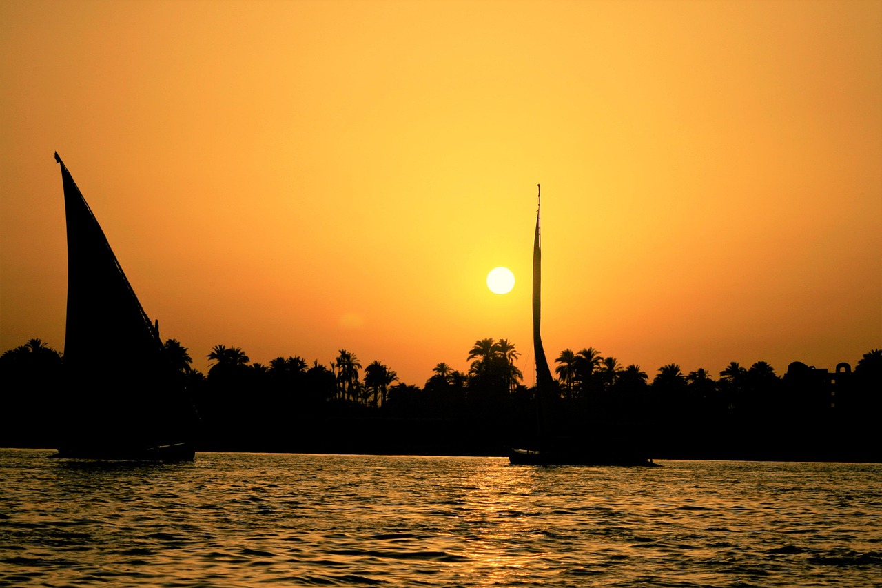 Embracing slow travel: A traditional felucca ride at sunset offers a tranquil escape from the modern rush.