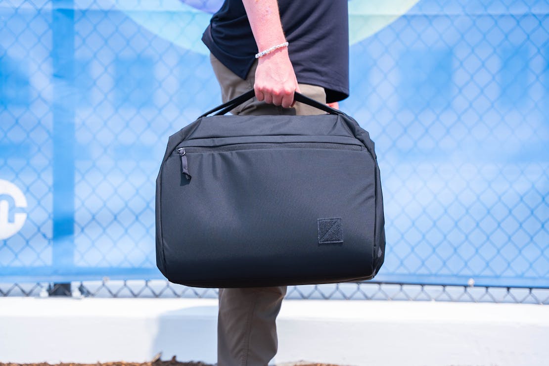 EVERGOODS Transit Duffel 35L being used in a transit environment.