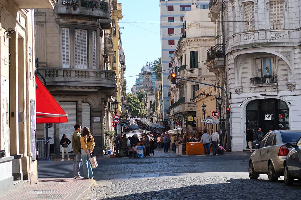 Historic colonial-style buildings with ornate balconies on a street in San Telmo.