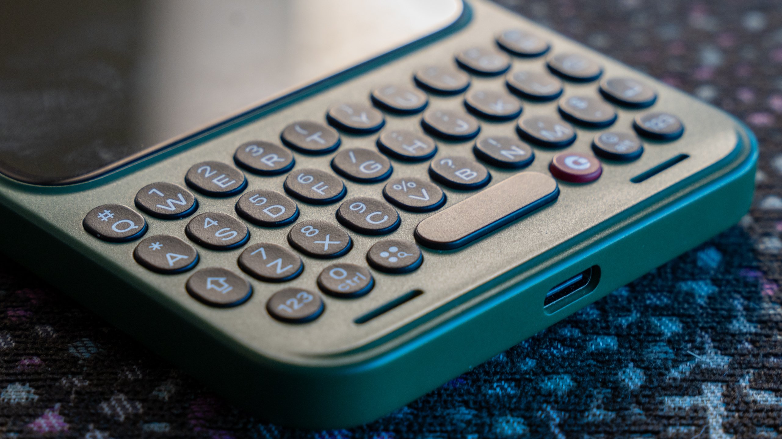 Multiple colorful removable rear shells for the Clicks Communicator phone.