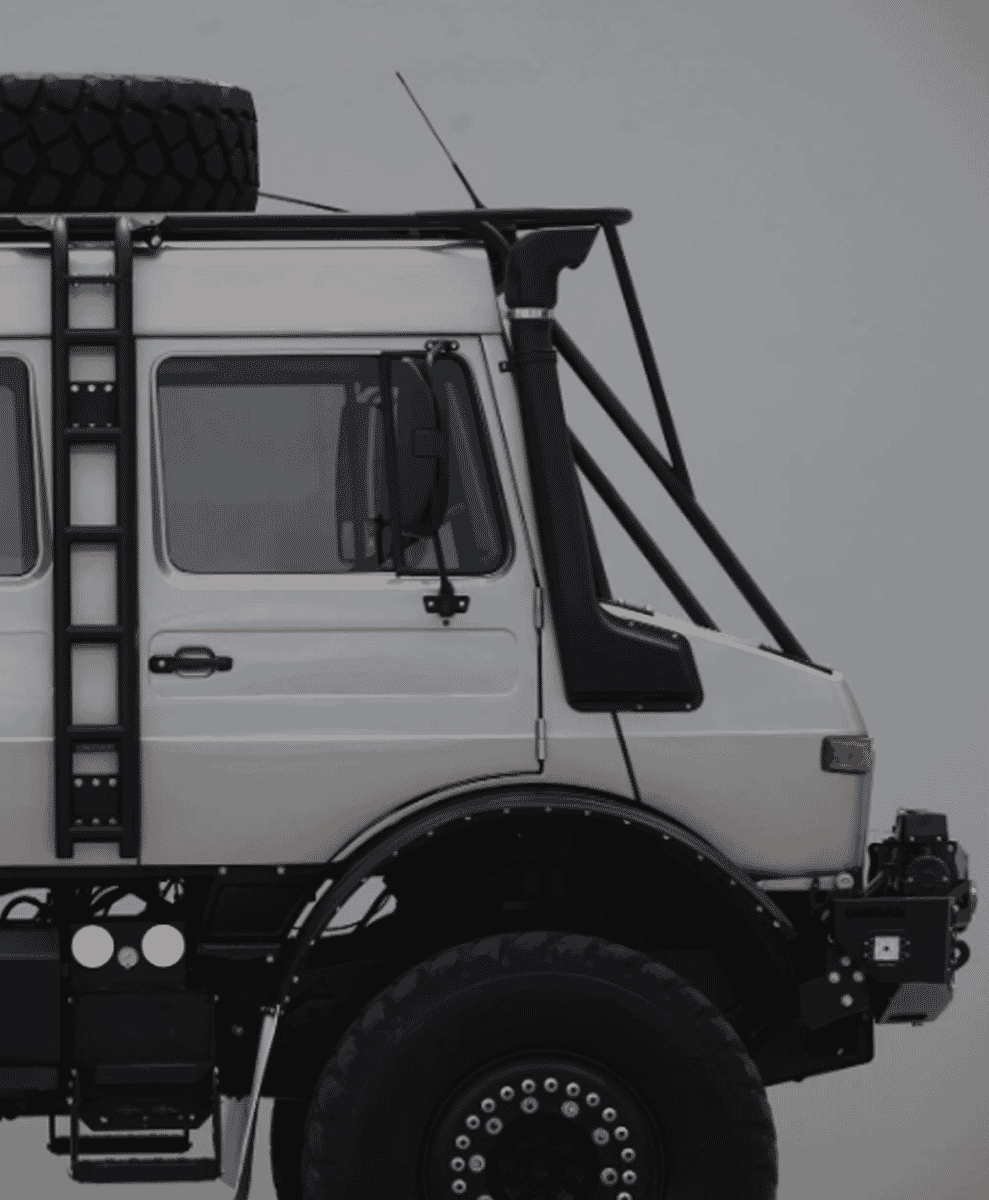 Close-up of the black utility accessories including the ladder, roof rack, and heavy-duty lighting on the U1700.