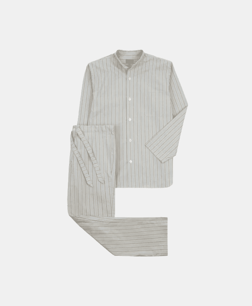 A flat lay of a light blue and white vertically striped pajama set with a mandarin collar.