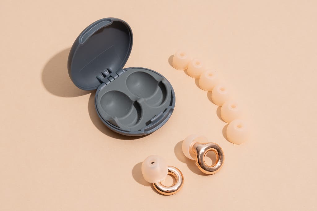 Loop earplug packaging showing the carrying case and four different sizes of silicone ear tips.