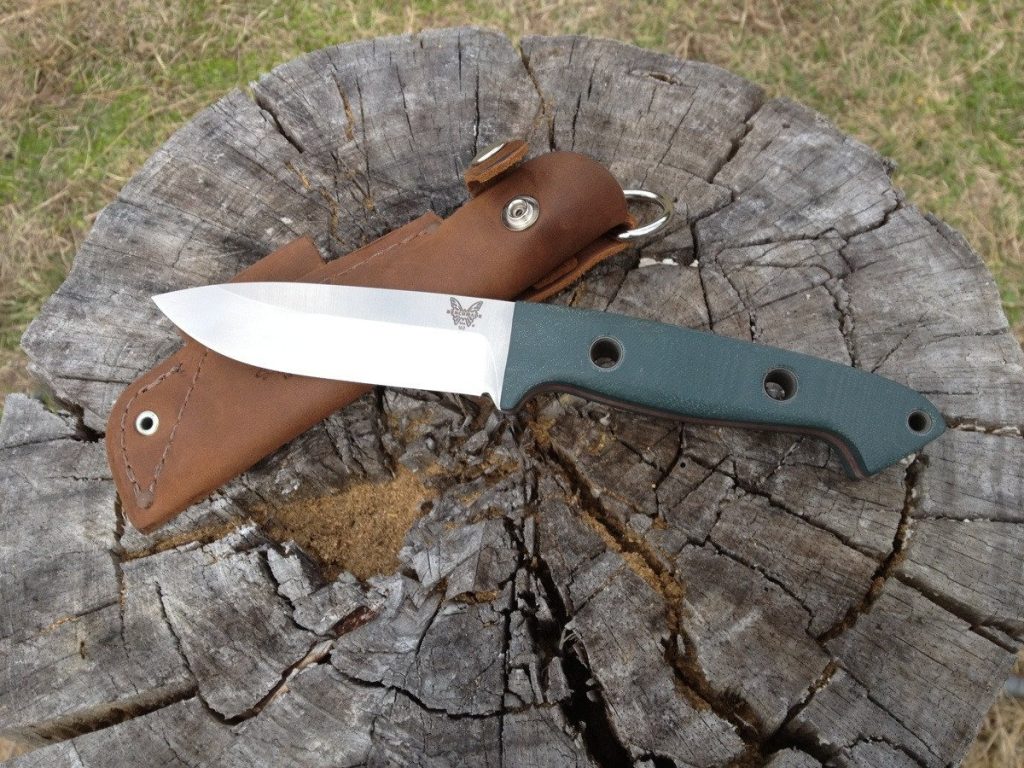 The Benchmade Bushcrafter 162 fixed blade knife on a neutral background.
