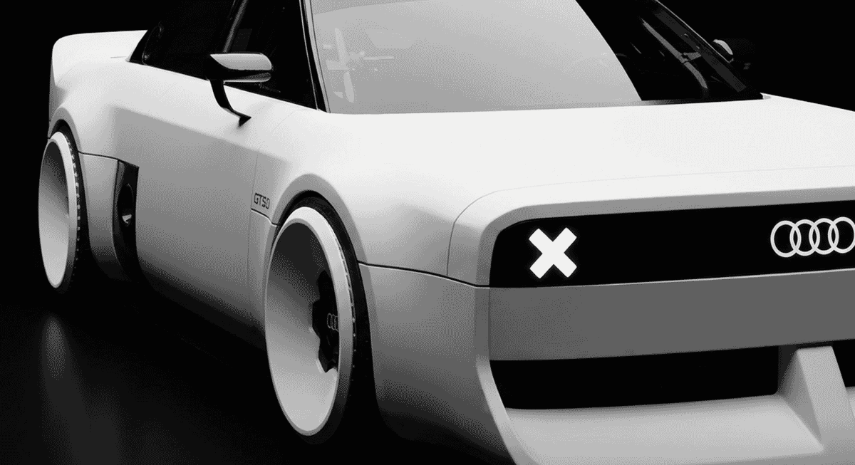 Close-up front view of a white futuristic Audi concept car highlighting the 'X' emblem and avant-garde styling.