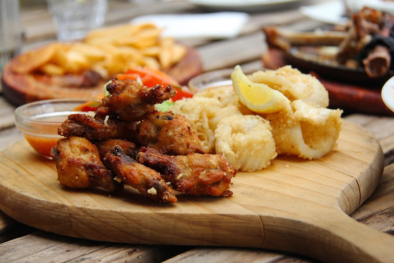Crispy 'pescaditos' and seafood platters are staples along the Barceloneta coast.