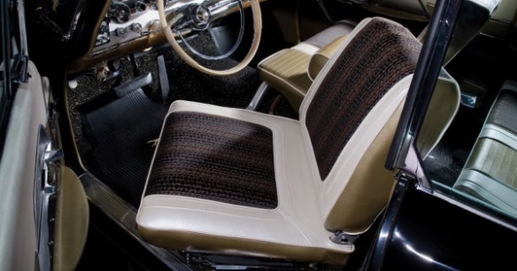 The interior of a 1959 DeSoto Adventurer with the driver's seat turned outward at an angle.
