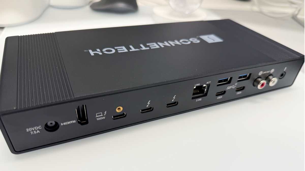 A professional Thunderbolt dock with multiple high-speed cables connected