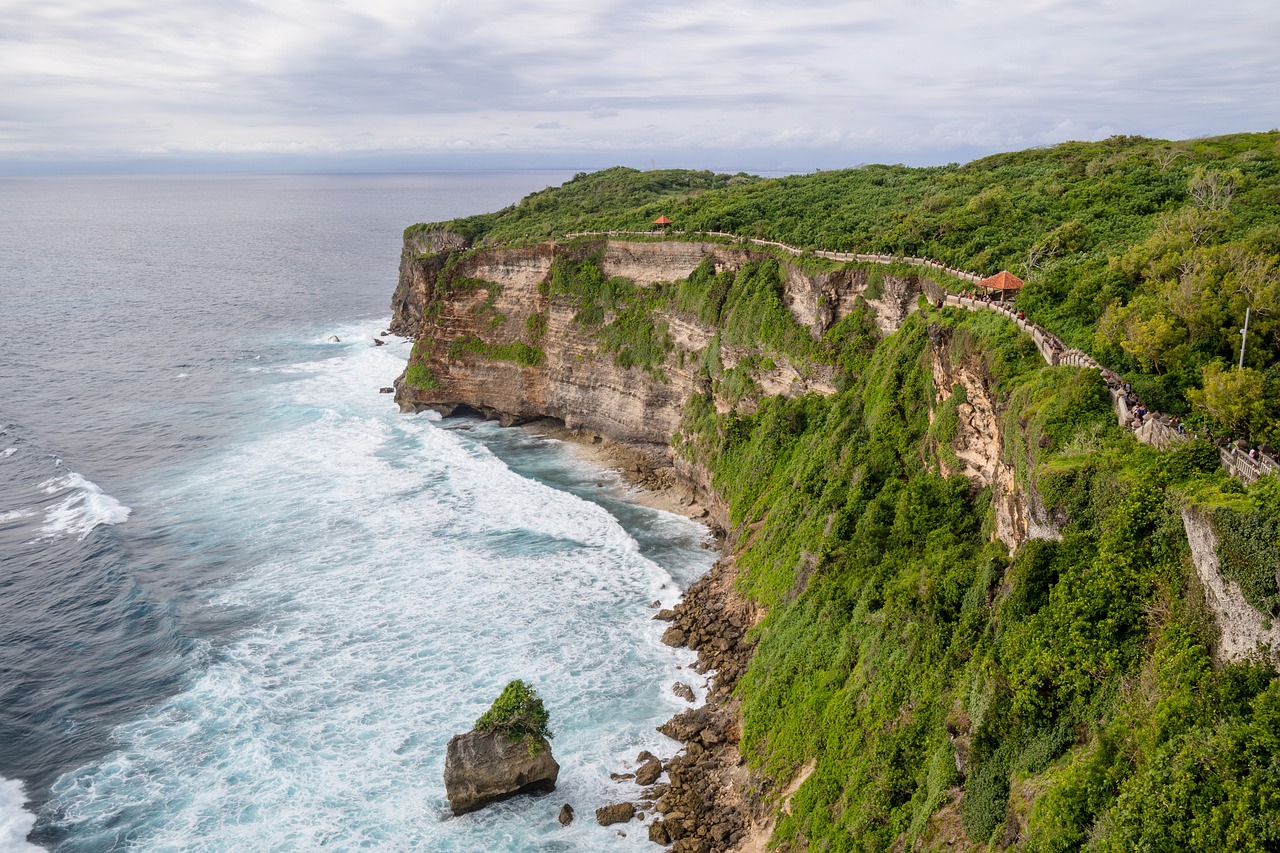 Uluwatu offers dramatic cliff views and world-class surfing conditions.