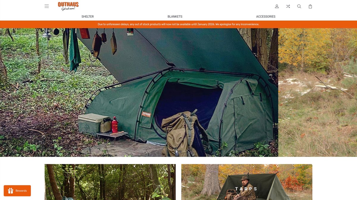 Durable canvas swags and tarps pitched in deep snow among evergreen trees.