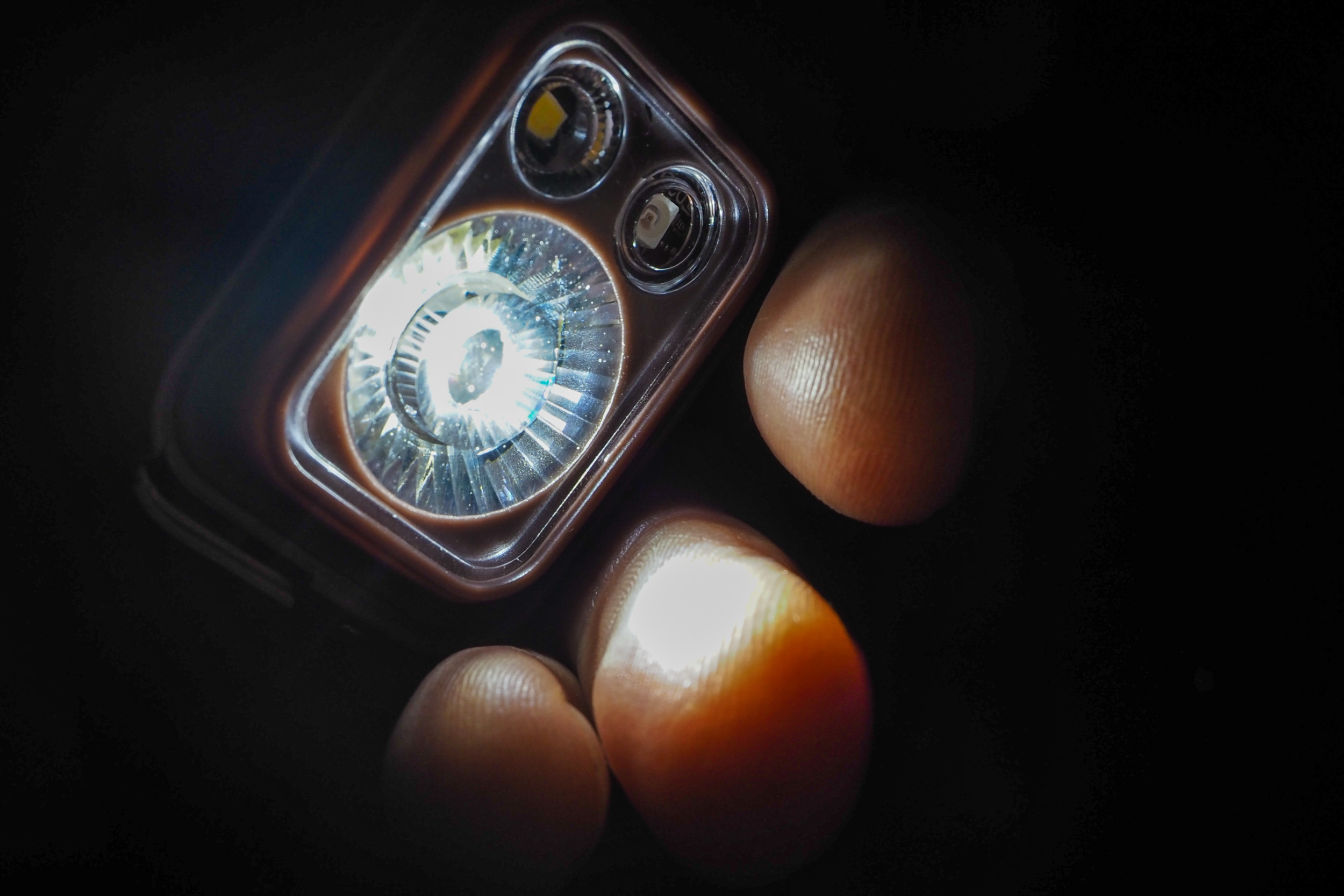 Close-up profile of a Black Diamond Spot 400-R headlamp.