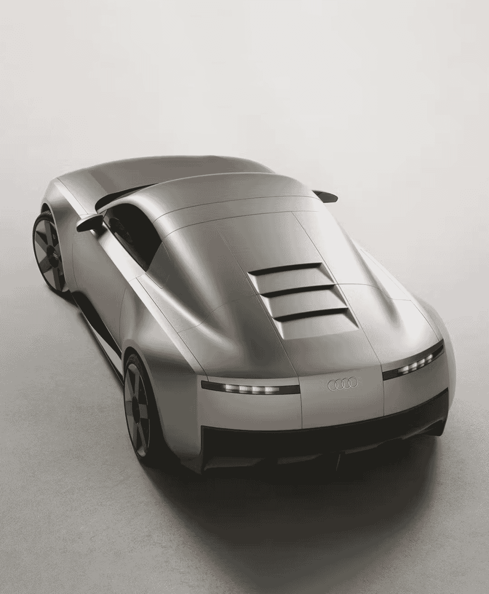 High-angle shot of a silver Audi concept car focusing on its rear vents and aerodynamic structure.