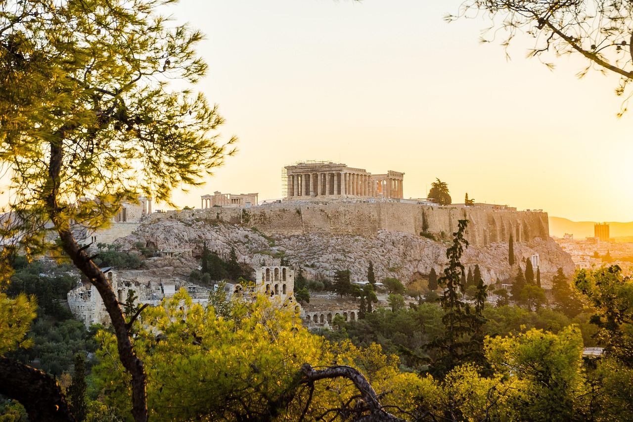 Ancient stone paths and olive groves overlooking the Mediterranean sea in Peloponnese.