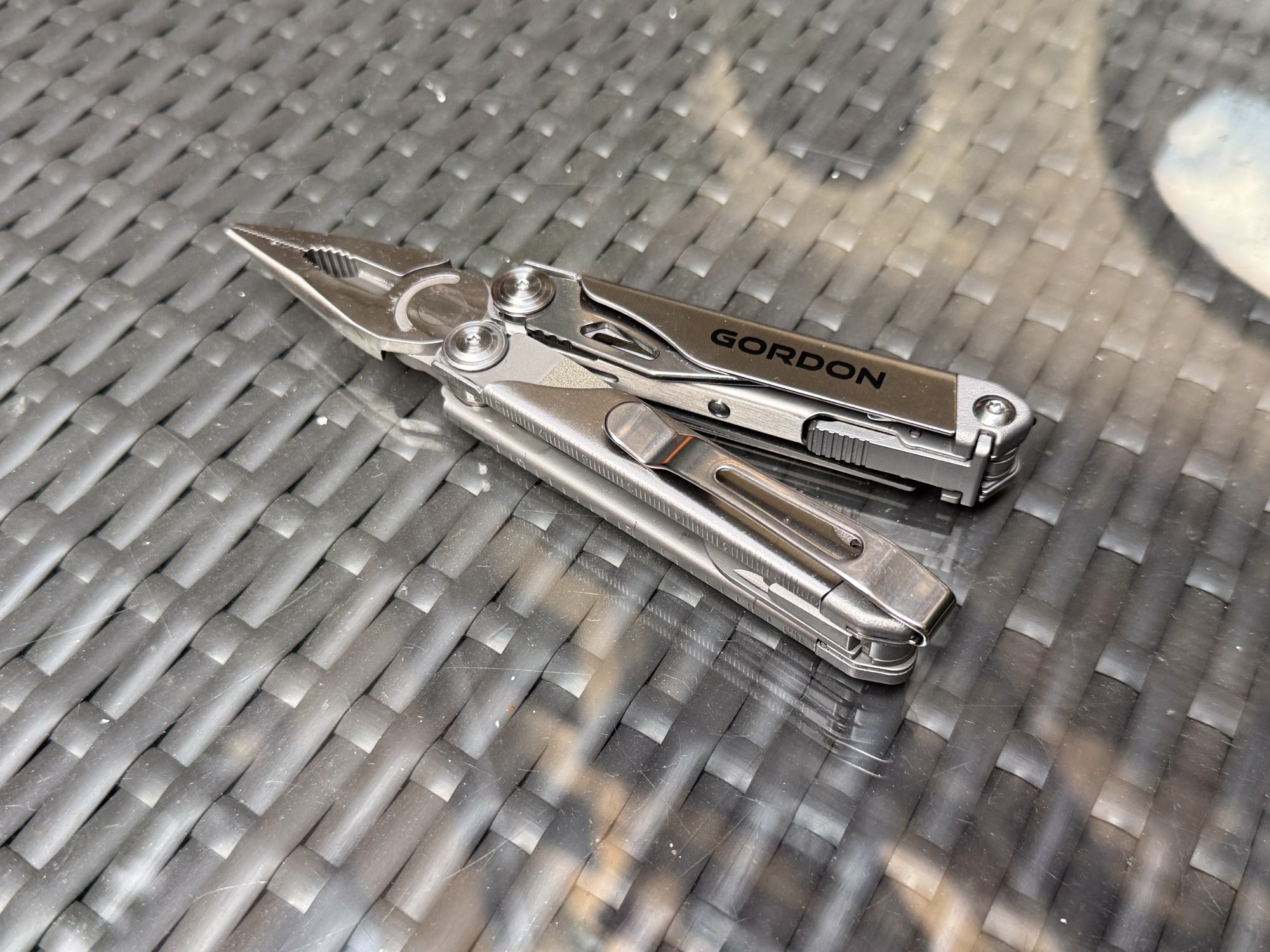 The Gordon multi-tool with its spring-loaded pliers fully opened.