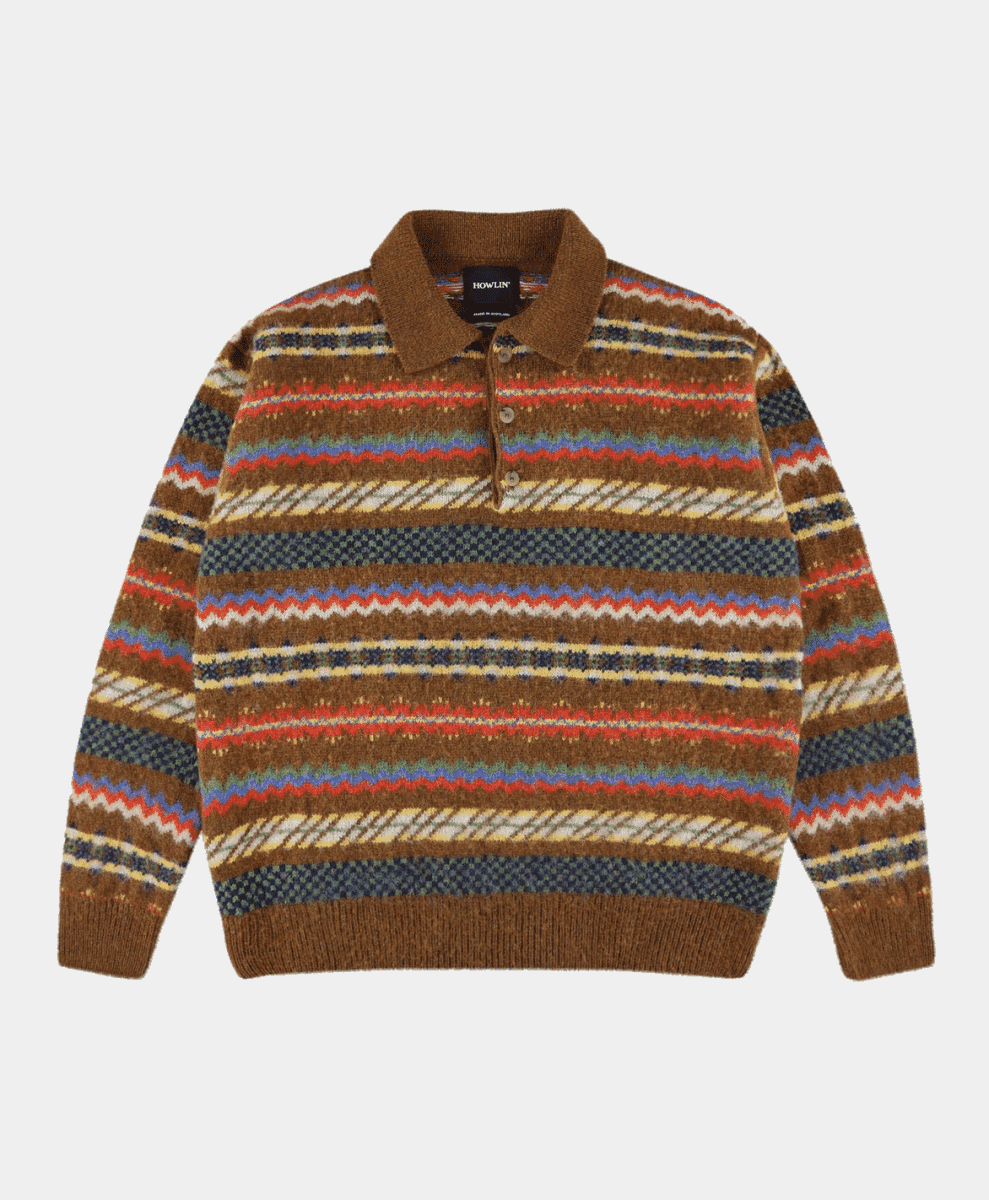 Flat lay of a brown knit polo sweater with colorful geometric patterns.