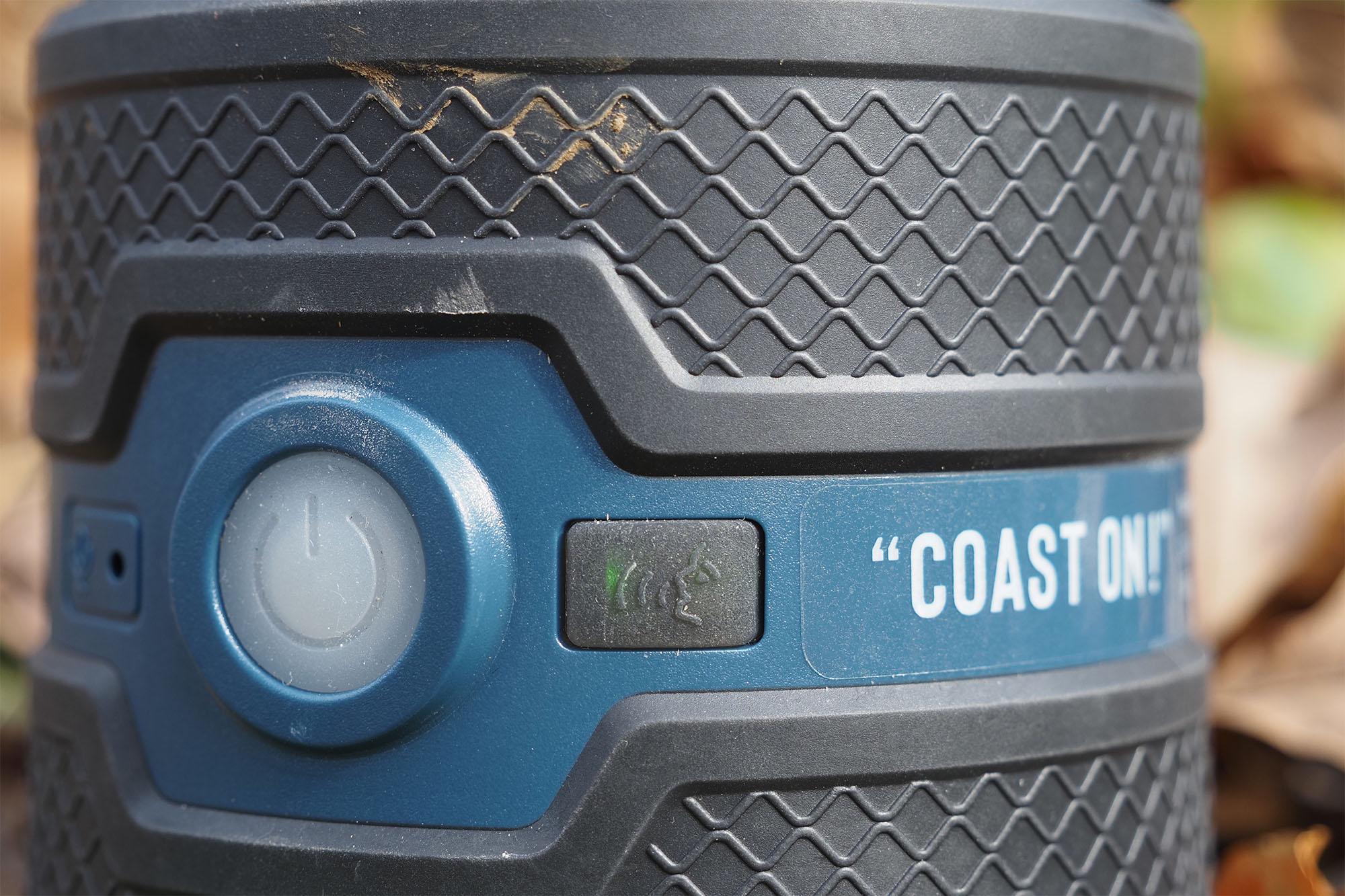 Close-up of the manual control panel and the SpeakEasy voice activation button on the lantern.