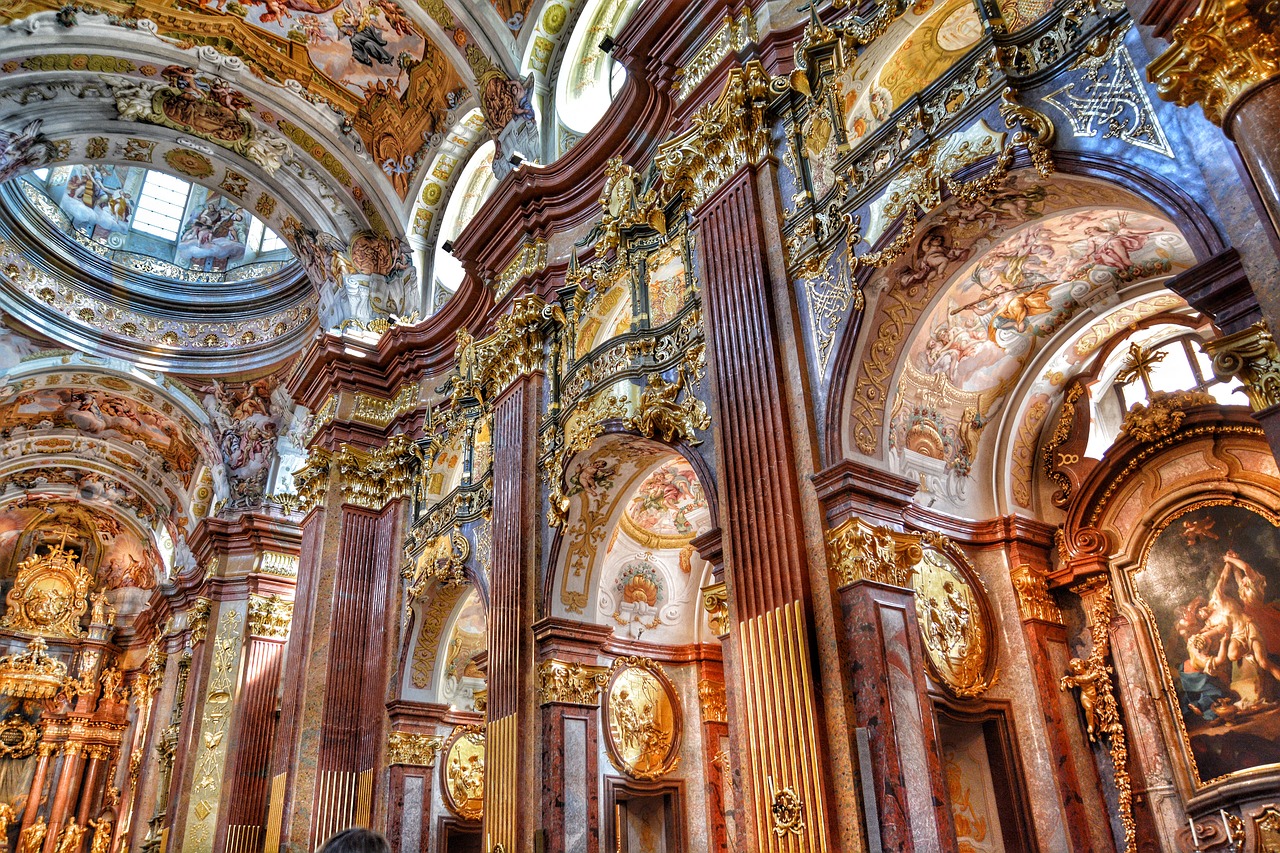 Elaborate ceiling frescoes in a Baroque library hall